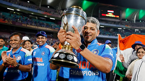 Coach Amol Muzumdar with the trophy