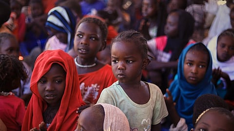 This photo released by the Norwegian Refugee Council (NRC) shows displaced children from el-Fasher at a camp where they sought refuge from fighting between government forces and the RSF in Tawila, Darfur region, Sudan, Monday, Nov. 3, 2025.
