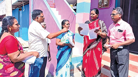 Image of election officials engaged in collecting voter details for SIR used for representational purposes only. 