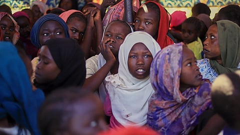 Displaced women and children from el-Fasher at a camp where they sought refuge from fighting between government forces and the RSF, in Tawila, Darfur region, Sudan, Monday, Nov. 3, 2025. 
