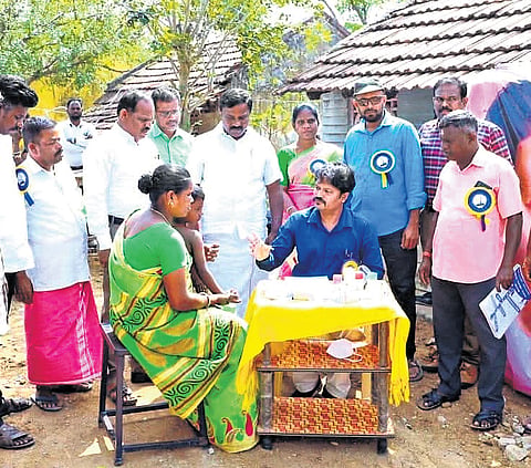  Dr Dhetchanamoorthy’s treating patients at a camp organised for treatment and for spreading social awareness on health issues.