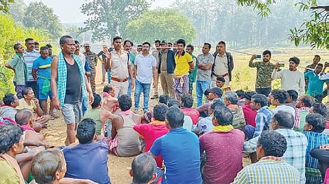 Police and forest personnel trying to pacify protesting villagers on Tuesday 