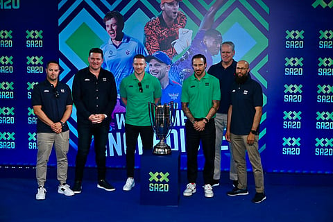 From (L) SA20 ambassador Mark Boucher, SA20 commissioner Graeme Smith, Paarl Royals captain David Miller, Jo'burg Super Kings captain Faf du Plessis, LSG Global Director of Cricket Tom Moody, MI Cape Town head coach Hashim Amla pose with the SA20 trophy at the SA20 India event in Mumbai on Wednesday 
