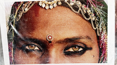 The postcard featuring Pappu Devi’s eyes