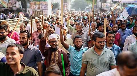 Activists of Bangladesh's Jamaat-e-Islami party stage a protest rally against a nationwide "lockdown" called by ousted Prime Minister Sheikh Hasina and her former ruling Awami League party, in Dhaka, Bangladesh, Thursday, Nov. 13, 2025. 