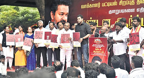 Leaders and functionaries of TVK staging a protest against the SIR of electoral rolls, in Chennai on Sunday 