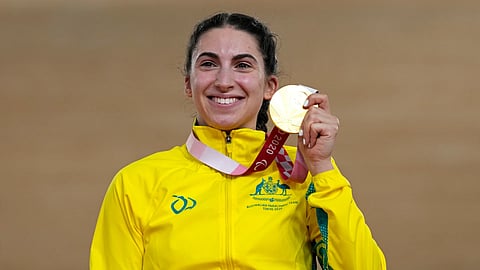 Paige Greco of Australia holds her gold medal after winning the Cycling Track Women's C1-3 3000m Individual Pursuit at the Tokyo 2020 Paralympic Games, Wednesday, Aug 25, 2021 in Izu, Shizuoka prefecture, Japan. 