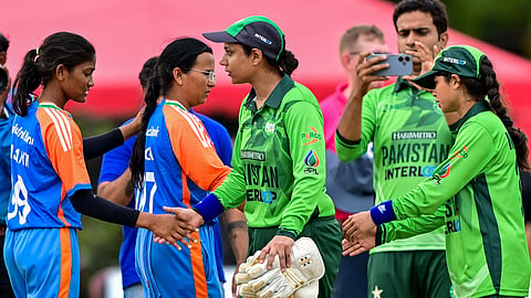 Pakistan's players (R) shake hands with India's players at the end of the Women’s Blind Twenty20 World Cup 2025 match between India and Pakistan at the BOI Cricket Stadium in Katunayake on November 16, 2025.