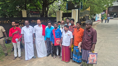 Caption: The people of Kattunayakkan community from Eral demonstrating at collectorate campus on Monday. 