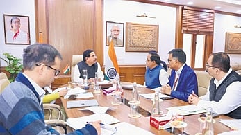 Patra in discussion with Union Food minister Pralhad Joshi in New Delhi on Thursday 