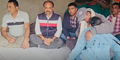 His family claims he was under severe work stress, riding nearly 100 km daily and working late into the night to complete voter list entries. 