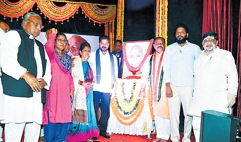 Chief Minister A Revanth Reddy takes part in the Ande Sri memorial meeting at Ravindra Bharati in Hyderabad on Saturday.