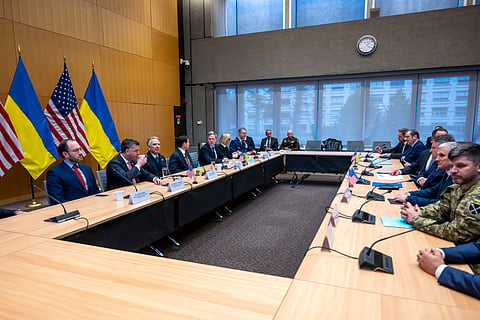 US, left, and Ukrainian, right, delegations at the beginning of their talks at the US Permanent Mission in Geneva, Switzerland, Sunday, Nov. 23, 2025.