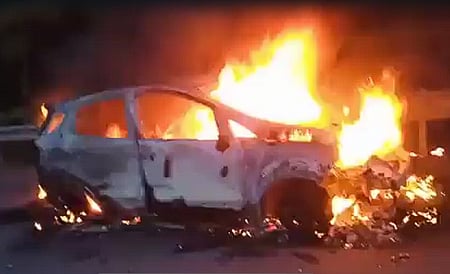 One of the car's tyres burst, causing the vehicle to veer off the Lebad-Nayagaon four-lane road, plunge into a culvert and catch fire at the spot about 20 km from the district headquarters, police said.
