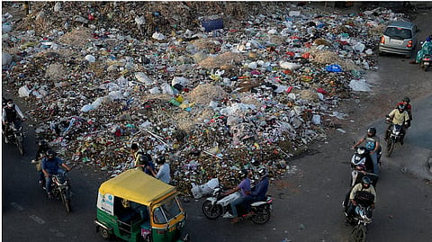 Garbage was dumped on a road in East Delhi on Friday 