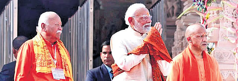 PM Narendra Modi, RSS chief Mohan Bhagwat, and CM Yogi Adityanath during the Dhwajarohan ceremony in Ayodhya.