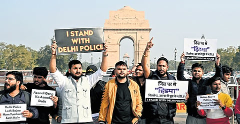 Members of Youth Stands for Society stage a protest at India Gate, supportingthe  Delhi Police, holding placards reading ‘Stop shielding anti-nationals’, ‘Nation against Naxalism’, accusing ‘anti-national elements’ of infiltrating civic protests 