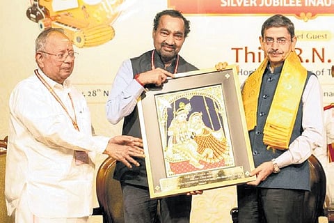 City Union Bank MD & CEO N Kamakodi felicitates Governor R N Ravi in Chennai on Friday 
