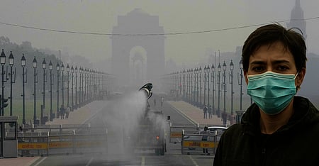 An anti-smog gun being used to spray water droplets to curb air pollution, at Kartavya Path in New Delhi.