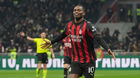 AC Milan's Rafael Leao celebrates after scoring the opening goal during the Serie A soccer match between AC Milan and Lazio, in Milan, Italy, Saturday, Nov. 29, 2025. 