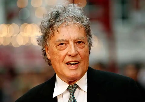 In this Sept. 4, 2012 file photo, British playwright Tom Stoppard poses as he arrives for the world premiere of “Anna Karenina,” in London. 
