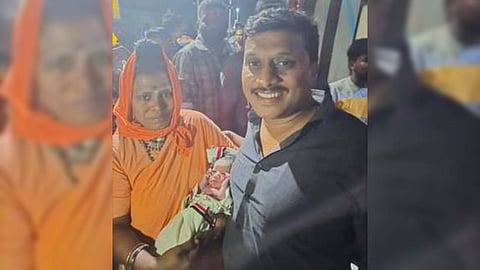 Dr. N. Kumaresan, Orthopedic surgeon, and Seethalakshmi, a Shaivite pilgrim, who helped the woman in labor deliver a baby.