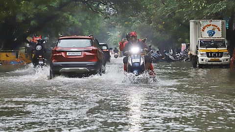 Chennai city witnessed constatnt rain leaving the streets flooded.  People seen moving on the flooded rain water at the 5th Avenue Anna Nagar on Tuesday.
