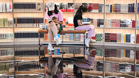 People read books at a book store in Shenzhen, China’s southern Guangdong province