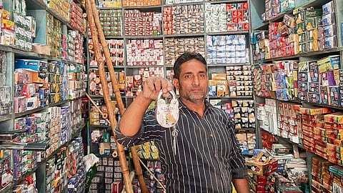 Mohammad Mukhtadir in his shop