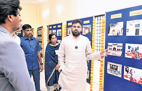 Deputy CM Pawan Kalyan goes around a photo exhibition after inaugurating the Divisional Development Office in Chittoor on Thursday 