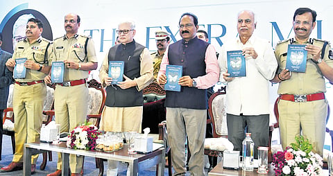 Governor Jishnu Dev Varma, DGP B Shivadhar Reddy and  Hyderabad Commissioner of Police VC Sajjanar during the launch of the book, ‘The Extra Mile’ on Friday 
