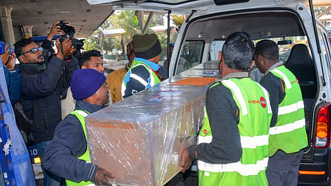 Mortal remains of the three youths Mohit Munda, Pradeep and Vinod Mahto, who were killed in a blaze at a nightclub in North Goa, being taken to their hometown, at Birsa Munda Airport, in Ranchi, Monday, Dec. 8, 2025. 