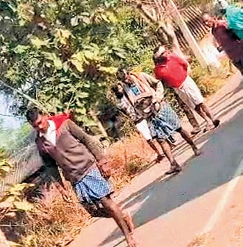 Video grab of Dhruba Rana being paraded on the street.