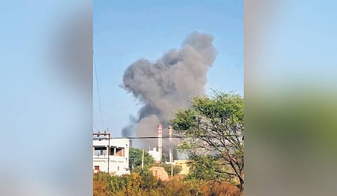 A thick plume of smoke billows from  the MS Agarwal Steel Industry in Manoharabad mandal on Monday
