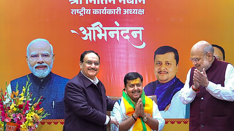 Union Ministers Amit Shah and JP Nadda congratulate newly appointed BJP National Working President Nitin Nabin during a ceremony, in New Delhi. 