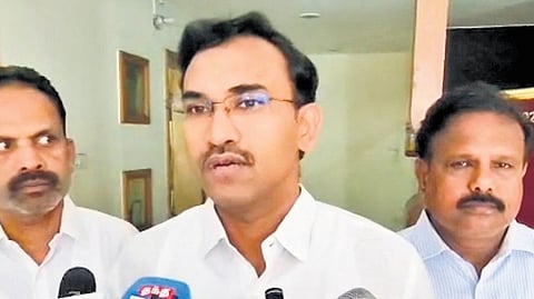 TVK general secretary for propaganda K G Arunraj addressing the media in Karur 
on Wednesday 