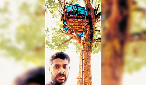 Sunil Titto, a techie from Pune in front of the tree house 