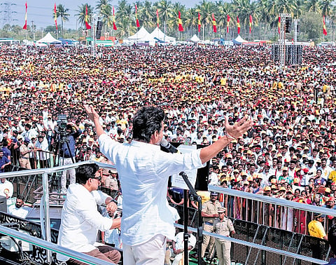 TVK president Vijay addressing a public meeting at Vijayamangalam in Erode district.