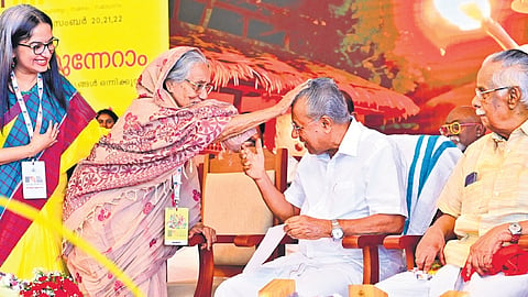 Actor Nilambur Ayisha sharing a light moment with Chief Minister Pinarayi Vijayan during the inaugural ceremony of Indian Cultural Congress at Rajendra Maidan in Kochi on Saturday. Writer T Padmanabhan is also seen.
