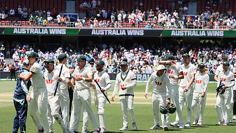 Australia's players celebrate after winning the third Ashes Test against England in Adelaide, Australia, Sunday, Dec. 21, 2025.