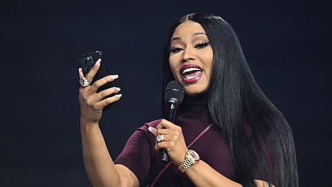 Nicki Minaj speaks during  Turning Point USA’s AmericaFest convention 2025, Sunday, Dec 21, 2025, in Phoenix
