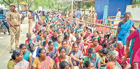 SC residents of Oorudaiyarpuram staging a protest in front of the collectorate in Tirunelveli on Monday 