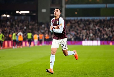 Aston Villa's Morgan Rogers celebrates after scoring their side's second goal of the game during the Premier League soccer match between Aston Villa and Manchester United, in Birmingham, England, Sunday Dec. 21, 2025. 