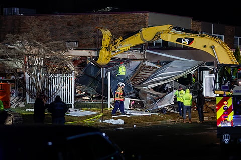 First responders work at the scene of an explosion and fire at Bristol Health & Rehab Center, Tuesday, Dec. 23, 2025, in Bristol, Pa.
