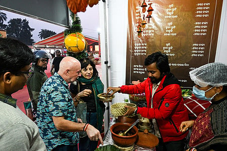 File | People thronged to eat traditional delicacies at Odisha Khadya Mahotsav