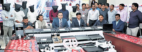 Cybercrime SP Adhiraj Singh Rana explains the modus operandi of international cybercrime network at a media conference in Vijayawada on Friday.