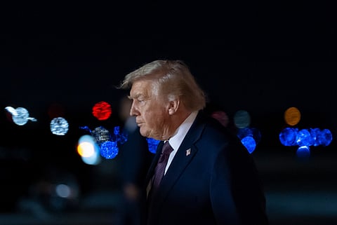President Donald Trump arrives on Air Force One at Palm Beach International Airport, Saturday, Dec. 20, 2025, in West Palm Beach, Fla. 