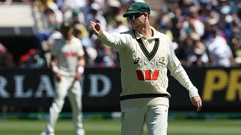 Australia's Steve Smith directs fielders on Day 2 of their Ashes cricket test match against England in Melbourne, Saturday, Dec. 27, 2025. 
