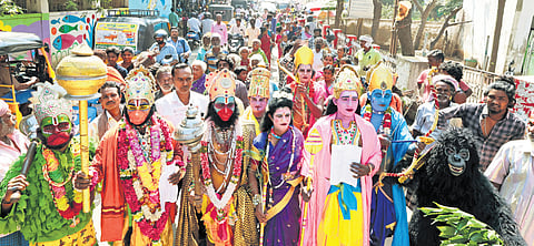Members of the Narikuravar community, from Sakkimangalam, dressed as Hindu gods, submitting petition to the collector demanding to light the lamp on the Thiruparankundram hill 