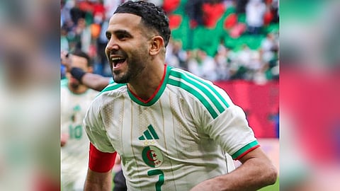 Riyad Mahrez celebrates after scoring from the spot in the 23rd minute.